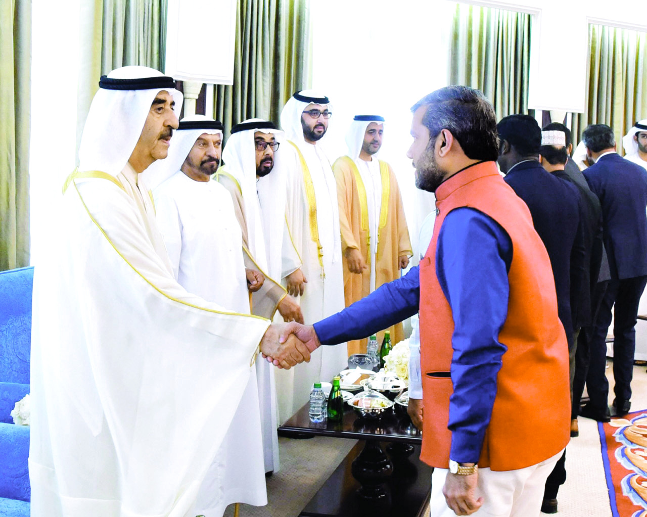 "حاكم أم القيوين خلال استقبال المهنئين بحضور راشد بن سعود"