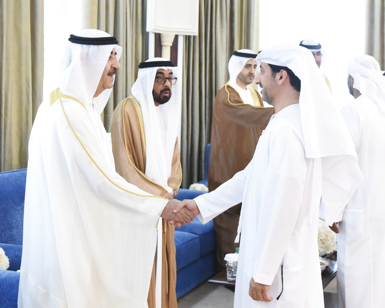 "سعود المعلا وراشد بن سعود خلال استقبال المهنئين"