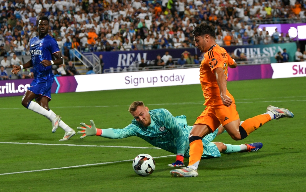 "جانب من لقاء ريال مدريد وتشيلسي - أ ف ب"