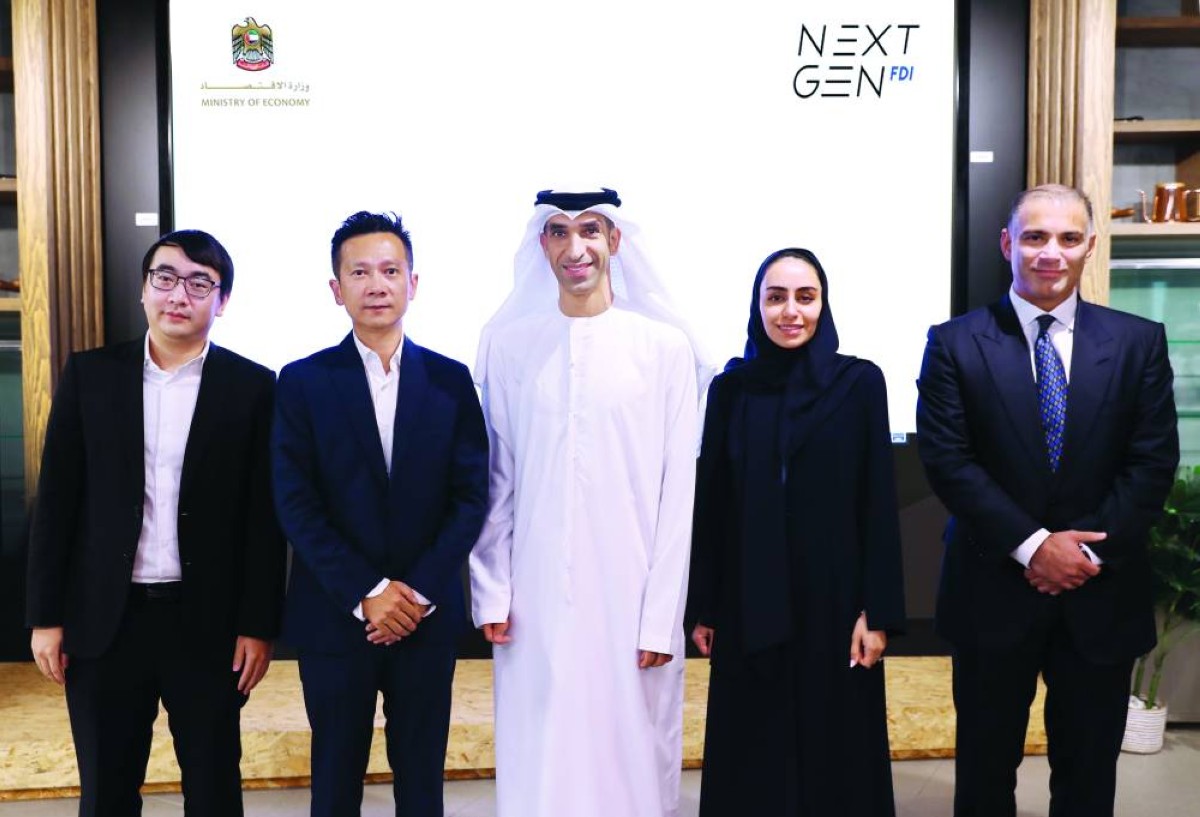 ثاني الزيودي وممثلو الشركتين خلال إعلان الانضمام إلى المبادرة