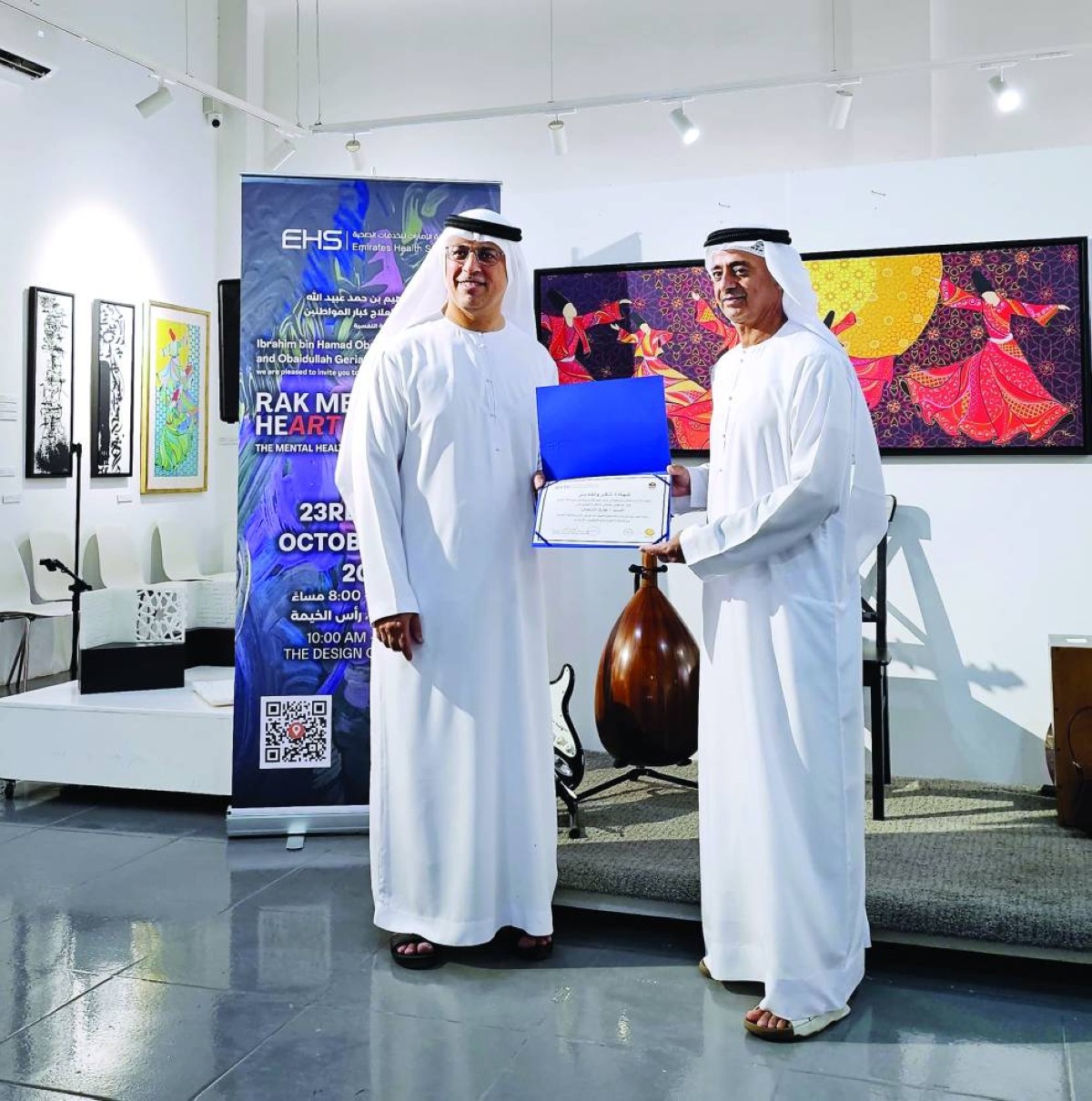 الدكتور يوسف الطير وطارق السلمان خلال الافتتاح