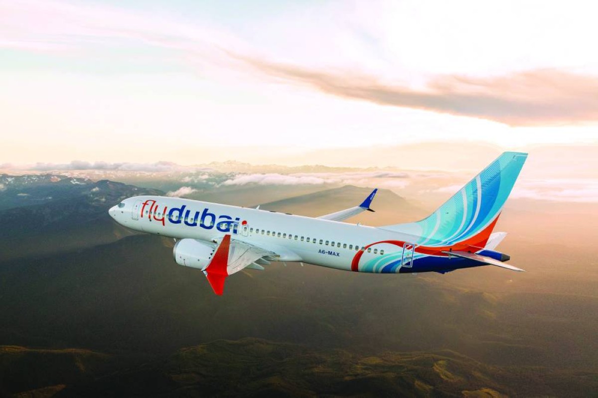 Flydubai Boeing 737 MAX 8 photographed on July 26, 2017 from Wolfe Air Aviation’s Learjet 25B.