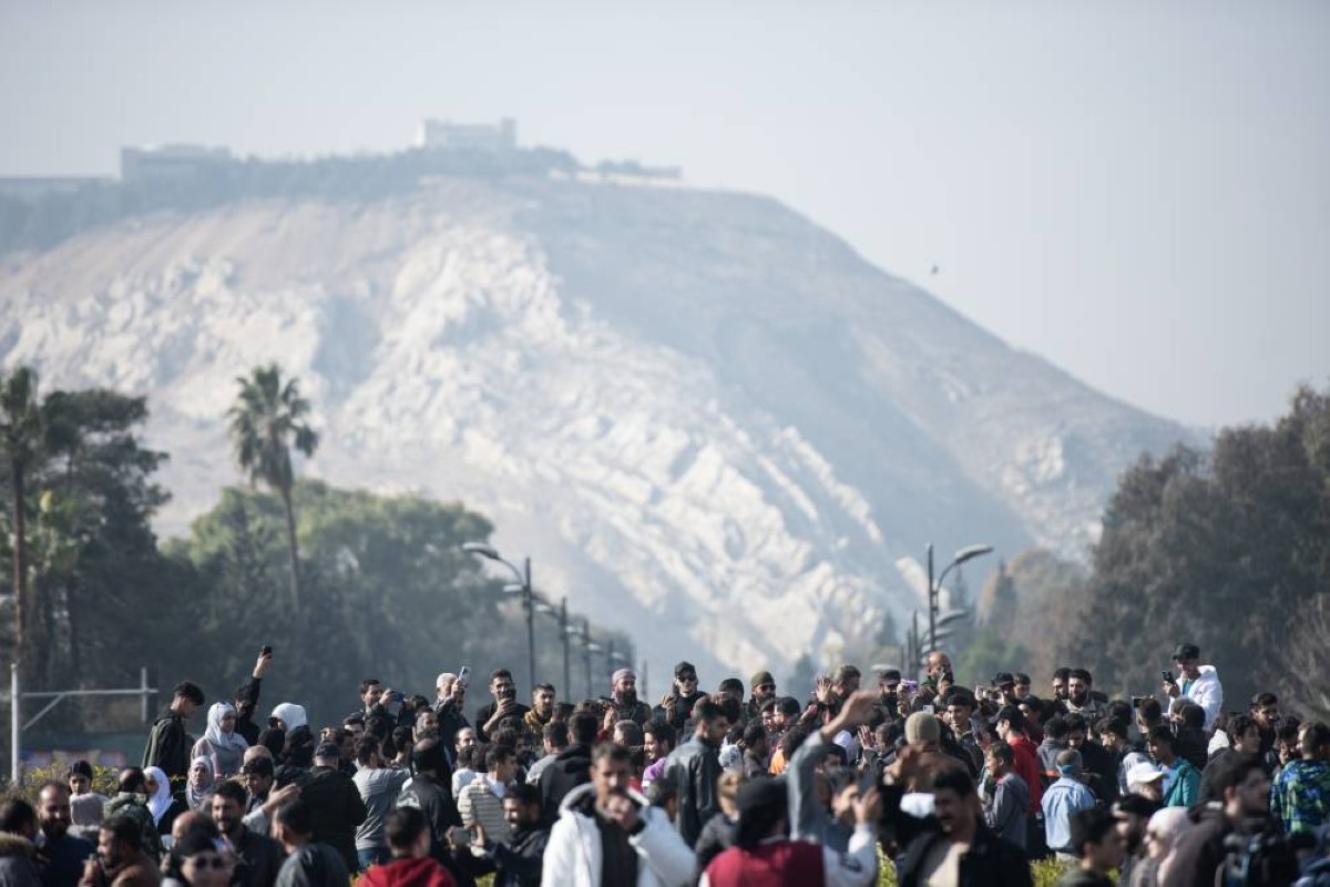 سوريون يحتفلون في حي المزة | إي.بي.أيه