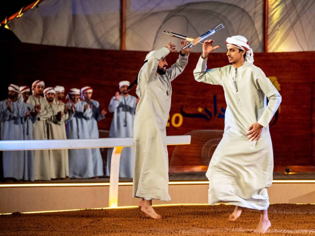 خالد المنهالي (يمين) خلال المنافسات