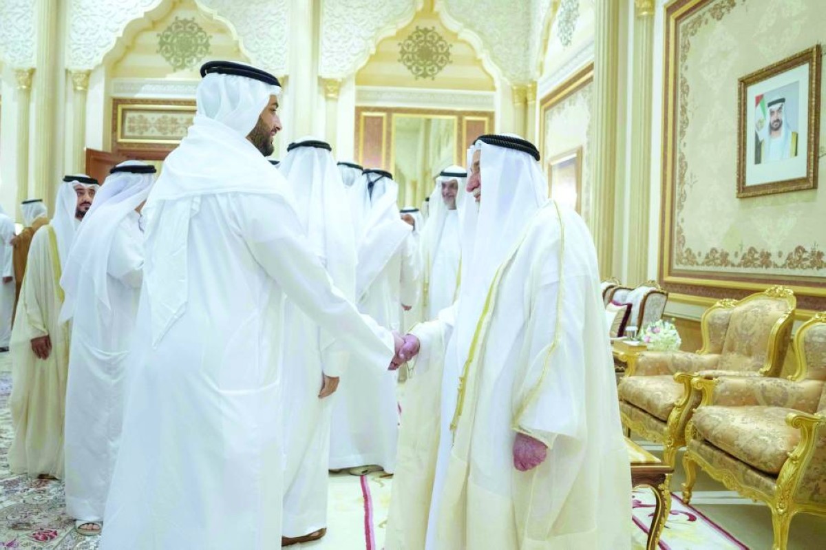  سلطان القاسمي وسلطان بن محمد بن سلطان خلال تقبل تهاني العيد