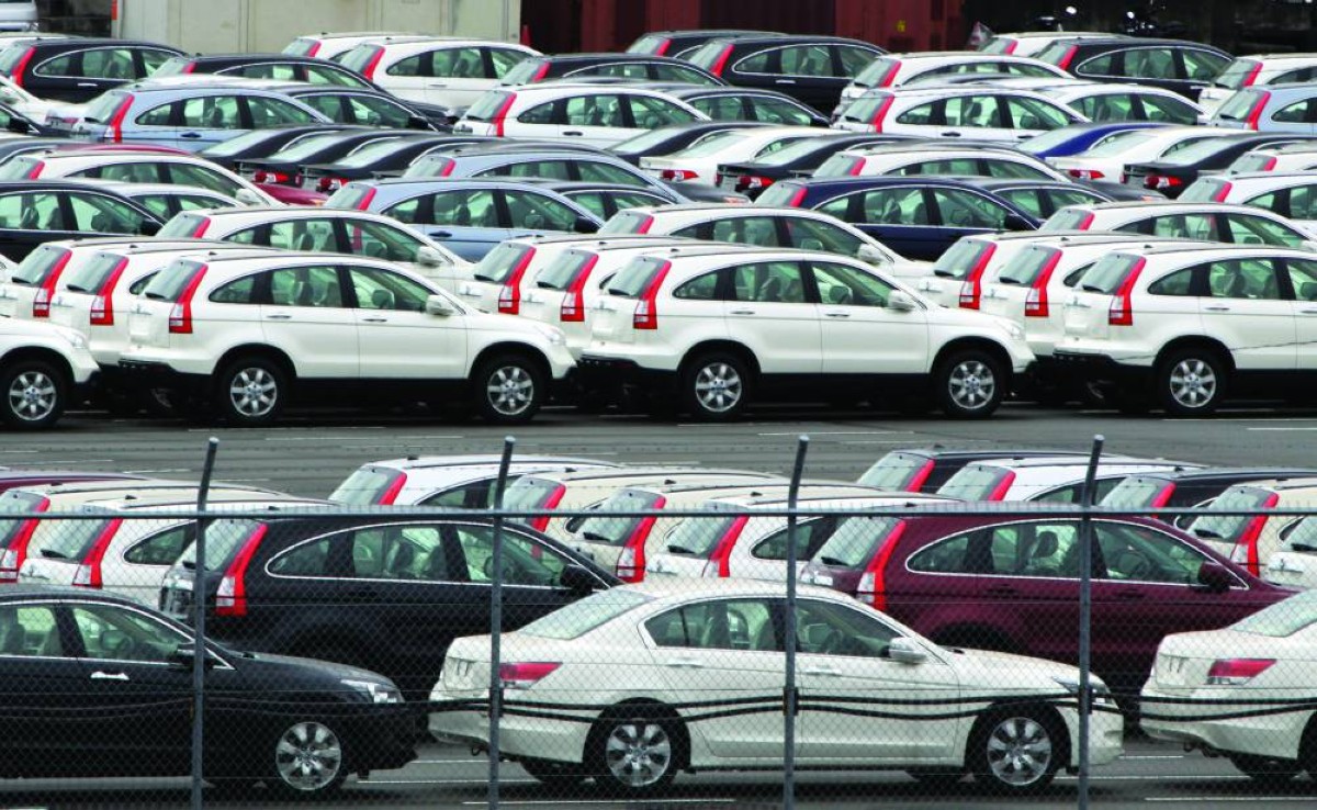 Honda Motor Co. vehicles bound for shipment sit in a lot in Yokohama City, Japan, on Tuesday, July 28, 2009. Honda Motor Co., Japan's second-largest automaker, is expected to announce earnings today. Photographer: Haruyoshi Yamaguchi/Bloomberg
