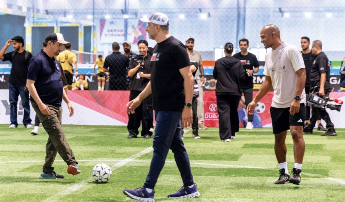 سعيد حارب وماهر جلفار وفلوران مالودا خلال حفل الافتتاح 