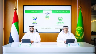 صلاح المرزوقي وعلي الفلاسي خلال توقيع الاتفاقية| من المصدر