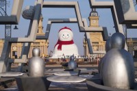 64 نحاتاً يشيّدون تمثالاً ثلجياً بارتفاع 19 متراً