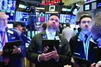 «وول ستريت» تصحح مسارها مع تقييم المستثمرين ⁠بيانات الوظائف