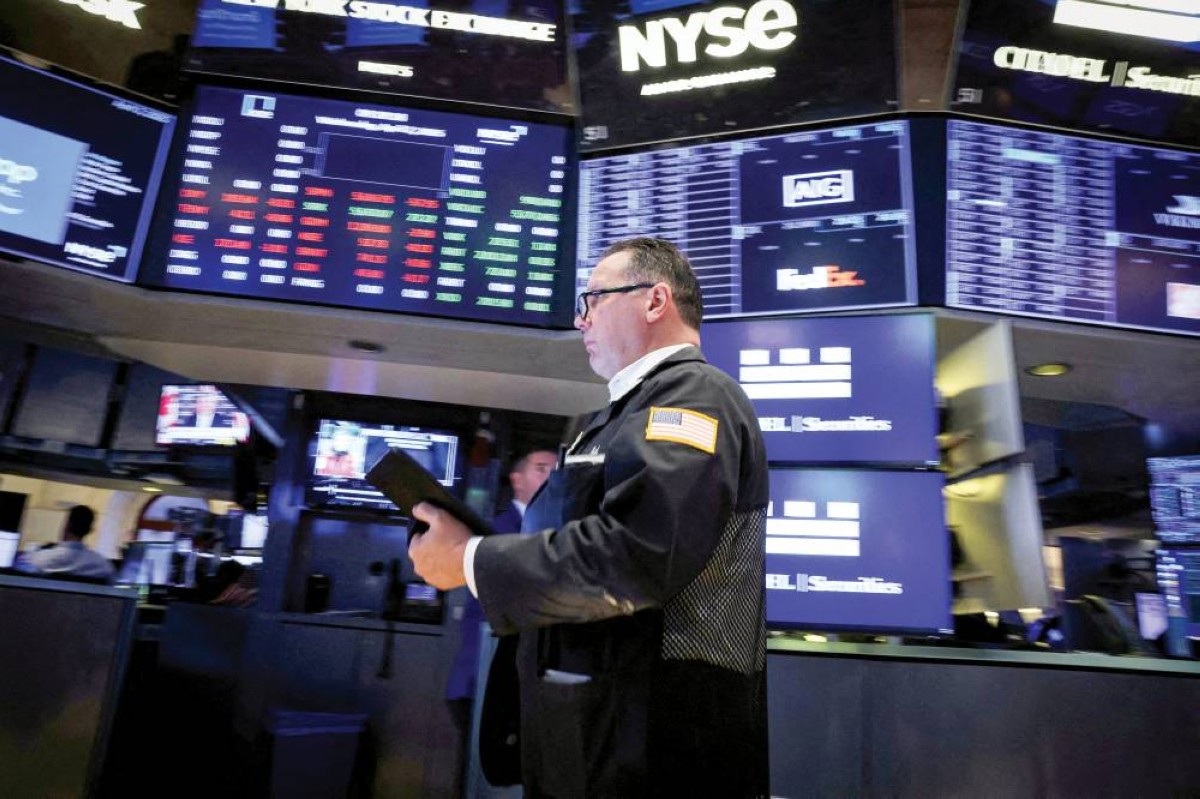 تباين «وول ستريت» مع تقييم نتائج أعمال الشركات