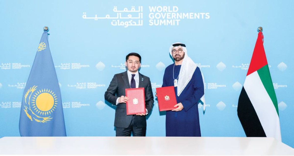 محمد القرقاوي وجاسلان ماديف عقب توقيع اتفاقية تجديد الشراكة مع كازاخستان في مجالات التحديث الحكومي