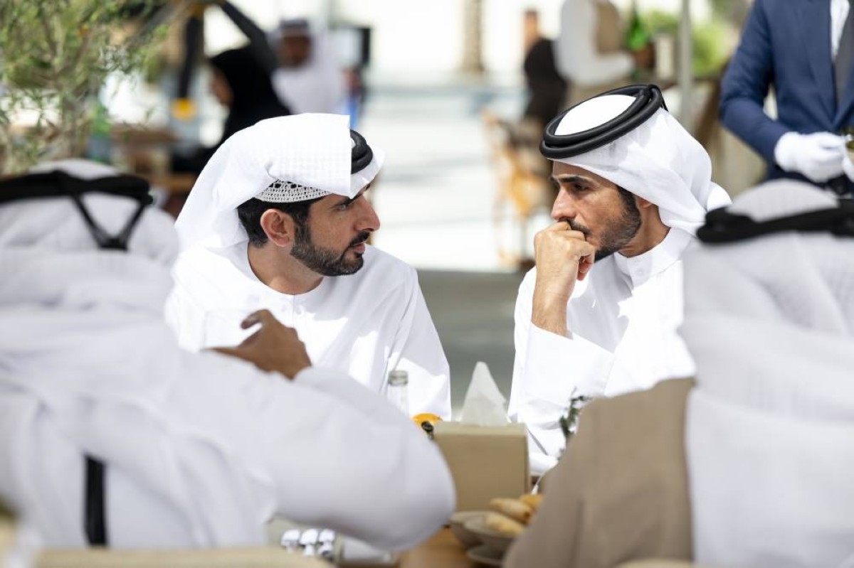 ABU DHABI, UNITED ARAB EMIRATES - February 14, 2026: HHH Sheikh Hamdan bin Mohamed Al Maktoum, Crown Prince of Dubai, UAE Deputy Prime Minister and Minister of Defence (L), speaks with HE Sheikh Khalifa bin Hamad bin Khalifa Al Thani, Minister of the Interior of Qatar (R), during a meeting at Erth.
( Abdulla Al Bedwawi / UAE Presidential Court )
---