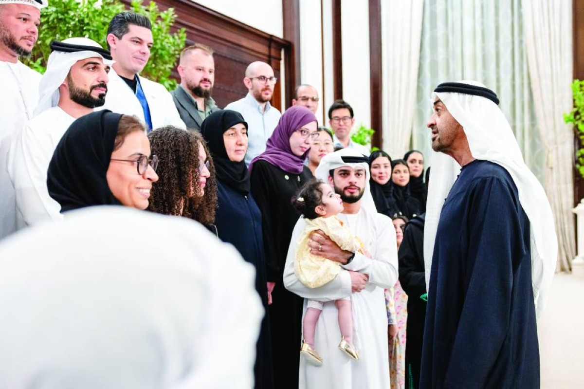ABU DHABI, UNITED ARAB EMIRATES - February 25, 2026: HH Sheikh Mohamed bin Zayed Al Nahyan, President of the United Arab Emirates (R), speaks with members of the Abu Dhabi Stem Cells Center (ADSCC), during an Iftar reception at Al Bateen Palace. Seen with Dr Fatima Al Kaabi, Executive Director of Abu Dhabi Bone Marrow Transplant Program at ADSCC (L).

( Ryan Carter / UAE Presidential Court )
---