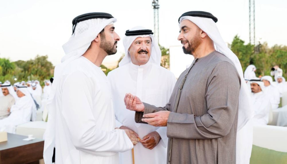  حمدان بن محمد في حديث مع سيف بن زايد بحضور سلطان بن حمدان 