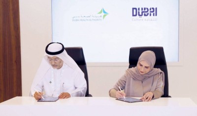 هالة بدري وعلوي الشيخ علي خلال توقيع المذكرة