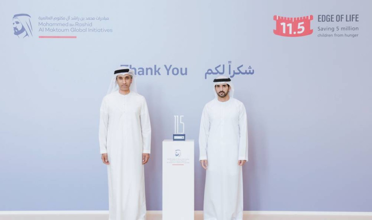 حمدان بن محمد خلال تكريمه عبدالله البسطي