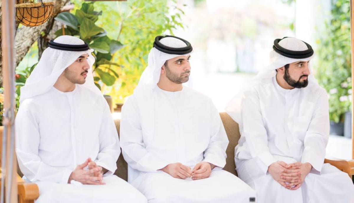  أحمد ومنصور بن محمد ومحمد بن راشد بن محمد خلال اللقاء 