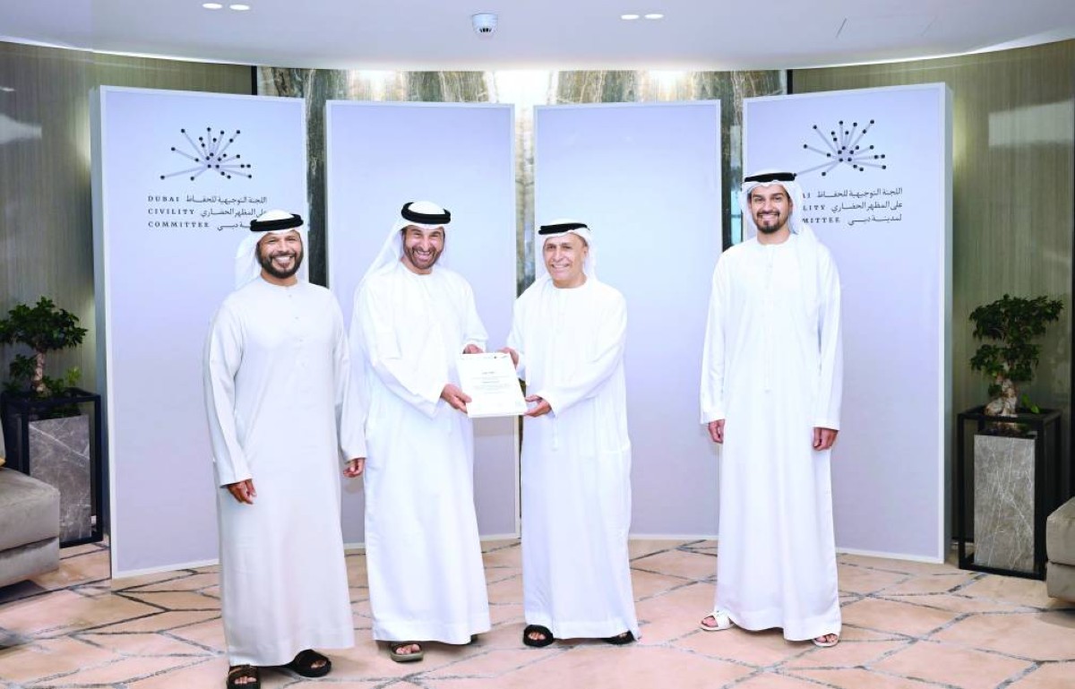 مطر الطاير ومروان بن غليطة وسعيد النظري خلال تكريم أحمد ناصر لوتاه