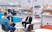 أحمد العامري في إحدى الفعاليات خلال مشاركة هيئة الشارقة للكتاب في المعرض