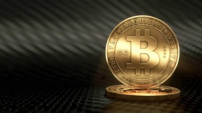«بيتكوين» تهبط إلى 60 ألف دولار