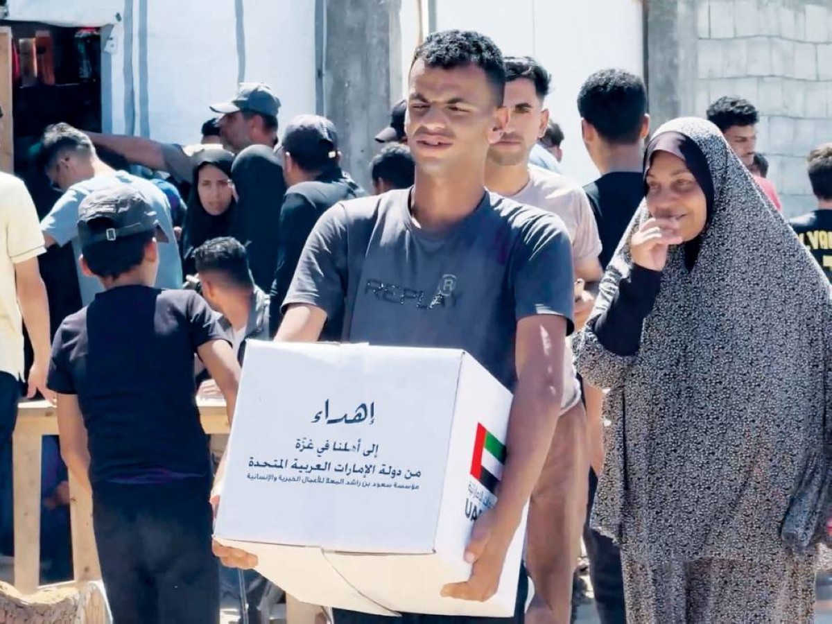 خلال توزيع المساعدات على أهالي القطاع