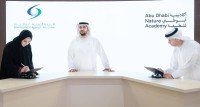 حمدان بن زايد يشهد توقيع شيخة الظاهري ومبارك الشامسي اتفاقية التعاون