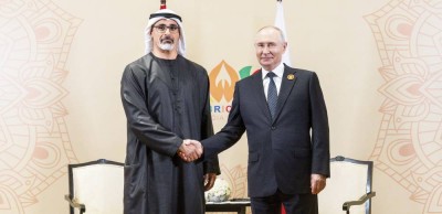 خالد بن محمد والرئيس الروسي خلال اللقاء