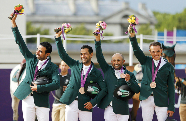 الصورة : أبطال الفروسية السعوديون خلال أولمبياد لندن 	أرشيفية