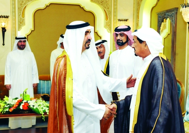 الصورة : حاكم عجمان يتلقى تهاني علي راشد لوتاه بحضور عمار بن حميد