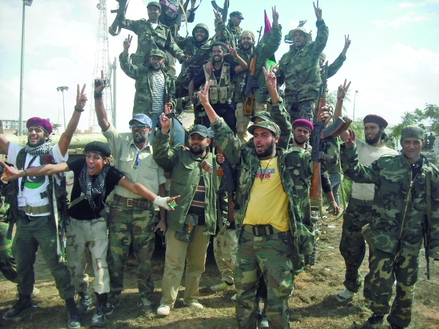 الصورة : الميليشيات الليبية انطلقت بقوة للسيطرة على الأرض والموارد	أرشيفية