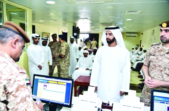 الصورة : محمد بن سعود خلال استكمال إجراءات التسجيل بالخدمة الوطنية   		وام