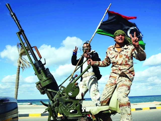 الصورة : تكاثر المليشيات في ليبيا أوقع البلاد بالفوضى وسهّل تغلغل المتطرفين  -   أرشيفية
