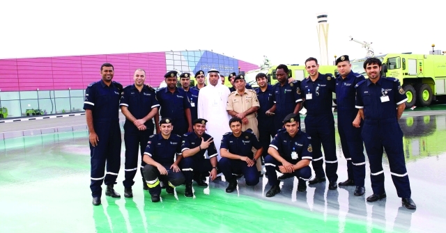 الصورة : بعض موظفي إدارة الإنقاذ والمطافئ في مطاري دبي الدوليين-	البيان