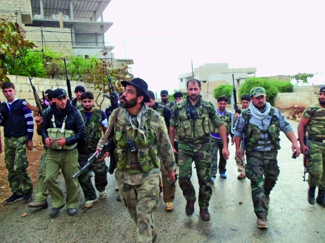 الصورة : إشراك مزيد من مقاتلي الجيش الحر لن ينهي القتال في سوريا	أرشيفية