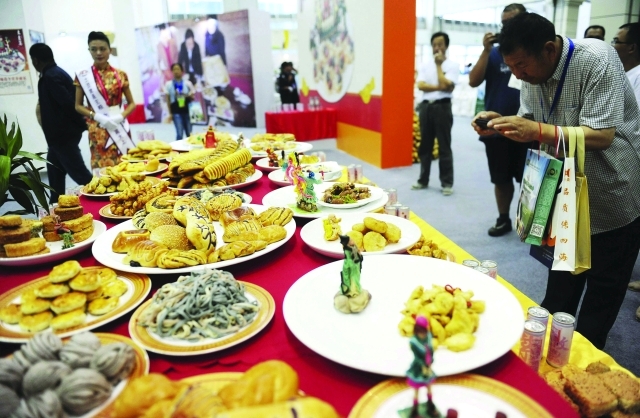 الصورة : عقد المؤتمر في يانجوينغ ورافقه معرض عن البطاطا   ــ رويترز