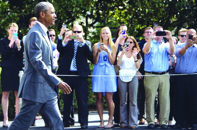 الصورة : أوباما يتفقد إعادة اعمار نيو أورلينز  |  أ.ف.ب