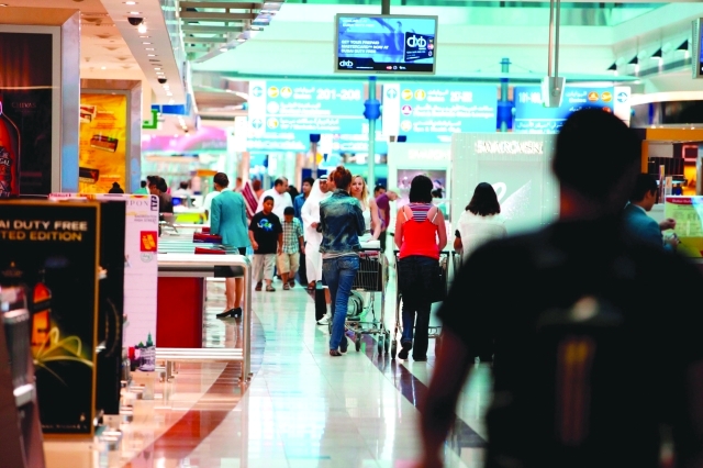 الصورة : ارقام قياسية للمسافرين عبر مطار دبي من المصدر