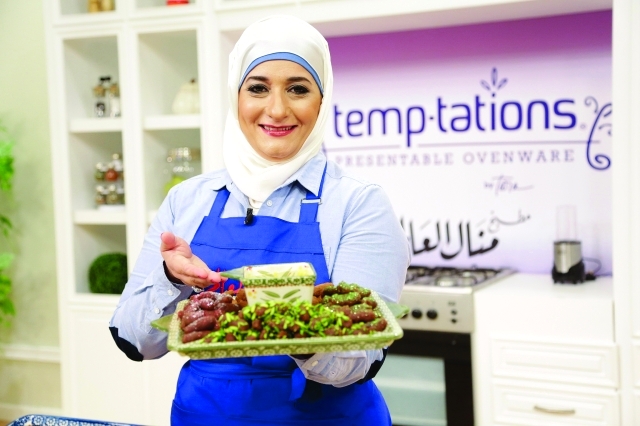 الصورة : منال العالم أحد مشاهير فعالية مأدبة الطعام مع النجوم - من المصدر