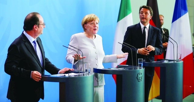 الصورة : ■  رئيس وزراء إيطاليا والمستشارة الألمانية ورئيس فرنسا  |  رويترز