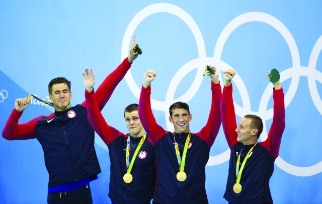 الصورة : ■ القرش فيلبس يضع أميركا على صدارة الأولمبياد  |  أ ف ب