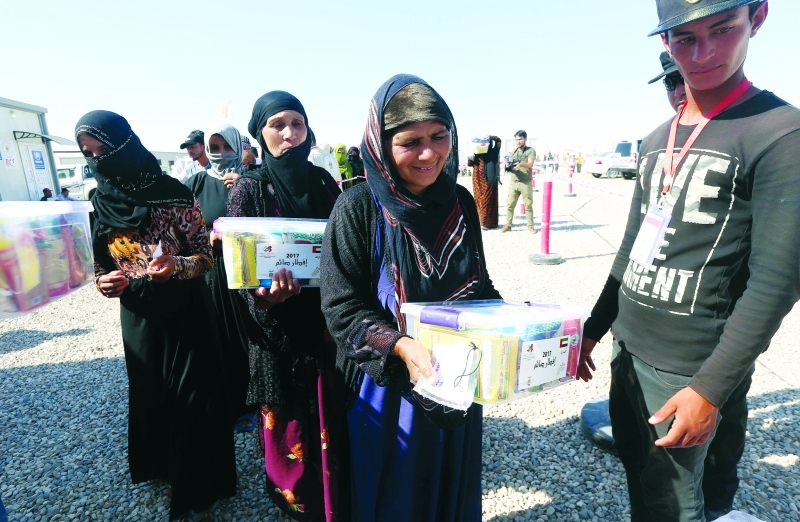 الصورة : خلال توزيع المساعدات الإنسانية في إقليم كردستان العراق | وام