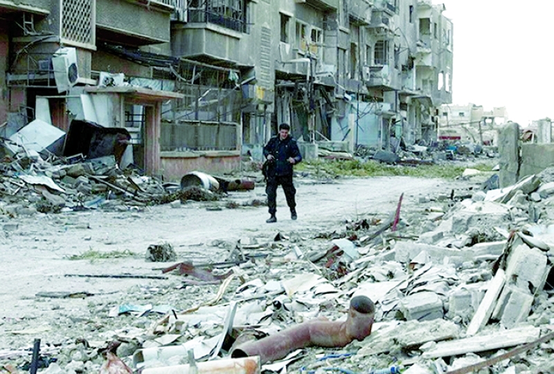 الصورة : ■ مشهد من آثار الدمار في سوريا بدعم من تنظيم الحمدين  |  أرشيفية
