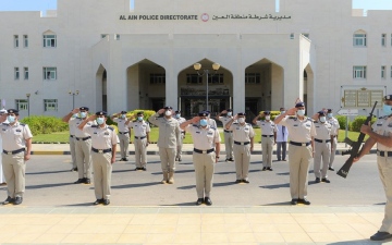 الصورة: الصورة: مديريات شرطة أبوظبي تحتفي بيوم العلم
