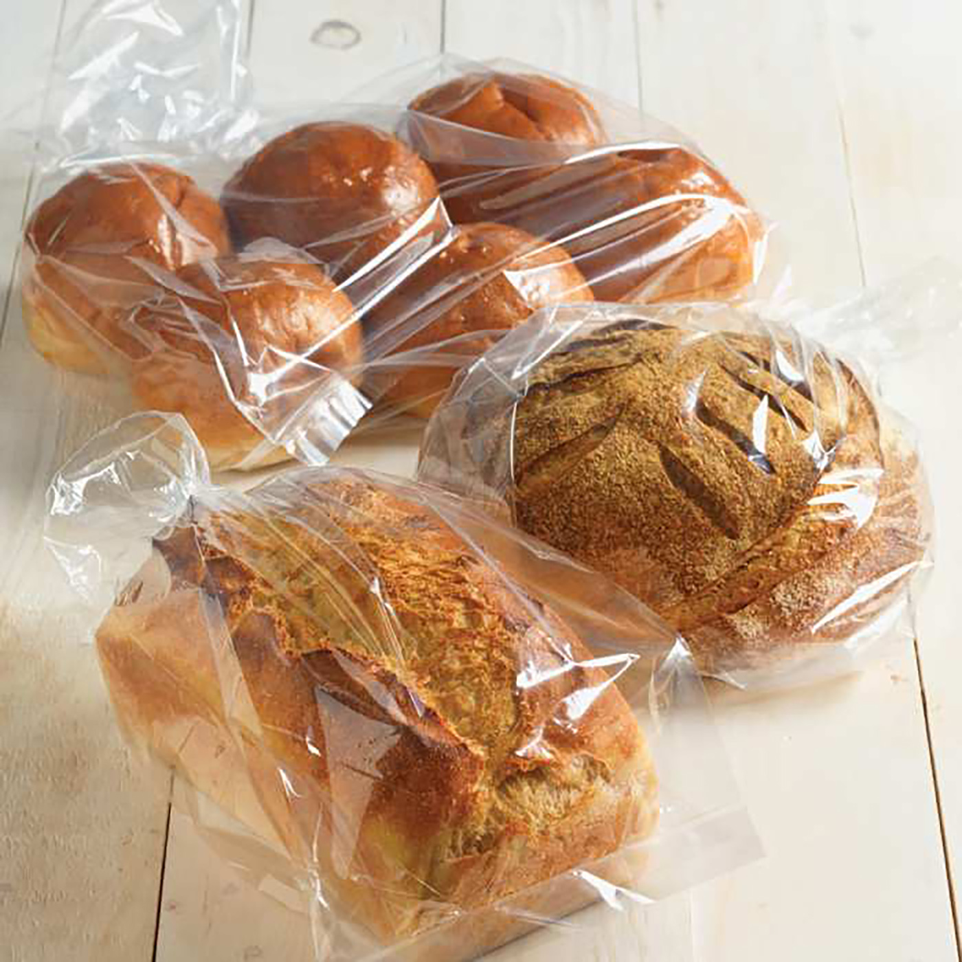 Булочки покупные. Упаковка хлебобулочных изделий. Пакеты для упаковки хлеба. Булочка в упаковке. Хлеб в полиэтиленовом пакете.