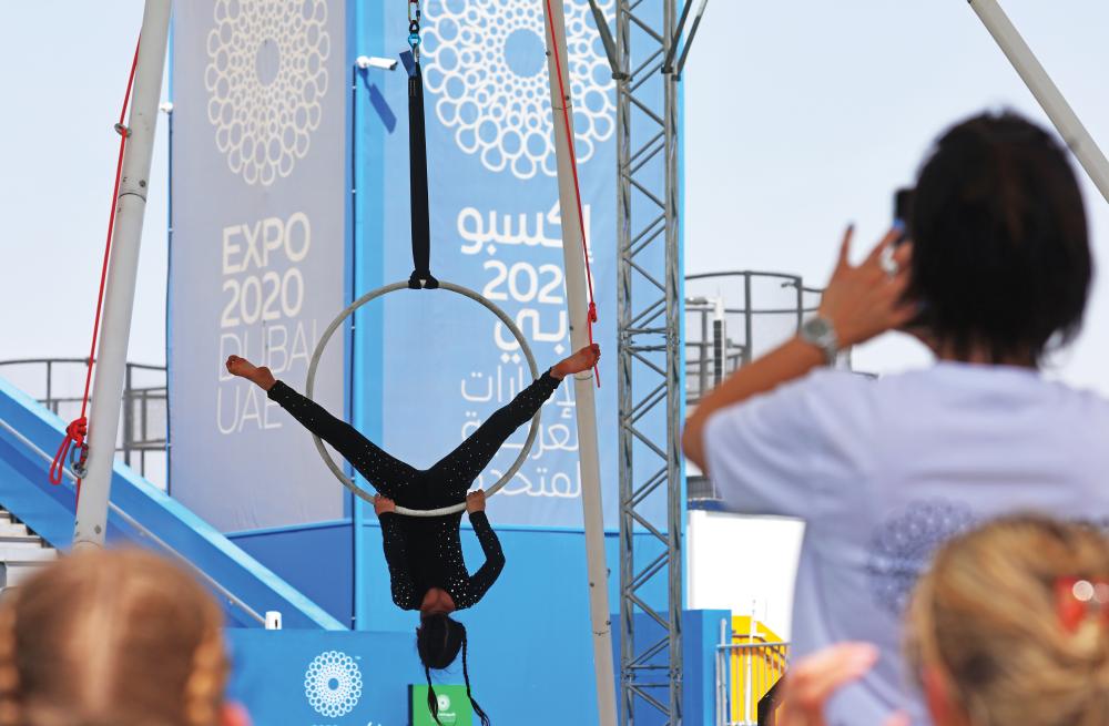 الصورة : DUBAI, 09 March 2022. Maiya Anoshko from Belarus performs during the World Aerial Gymnastics Championship 2022 (Day 1) at Expo Sports Arena, Expo 2020 Dubai. (Photo by David Gray/Expo 2020 Dubai)