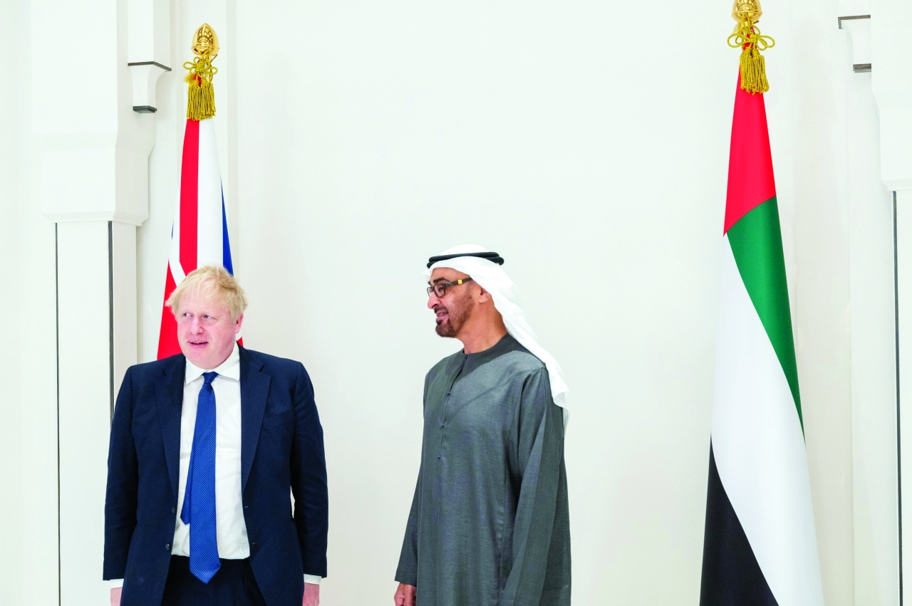 الصورة : ولي عهد أبوظبي خلال استقباله رئيس وزراء بريطانيا