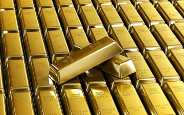 الصورة: الصورة: الذهب ينخفض مع صعود الدولار