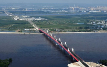 الصورة: الصورة: افتتاح أول جسر سريع بين روسيا والصين