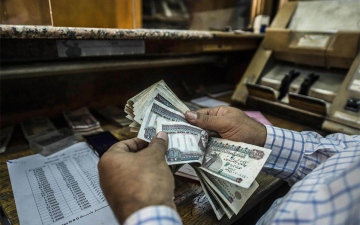 الصورة: الصورة: هل يتأثر سعر صرف الدولار مقابل الجنيه المصري بعد رفع الفائدة؟